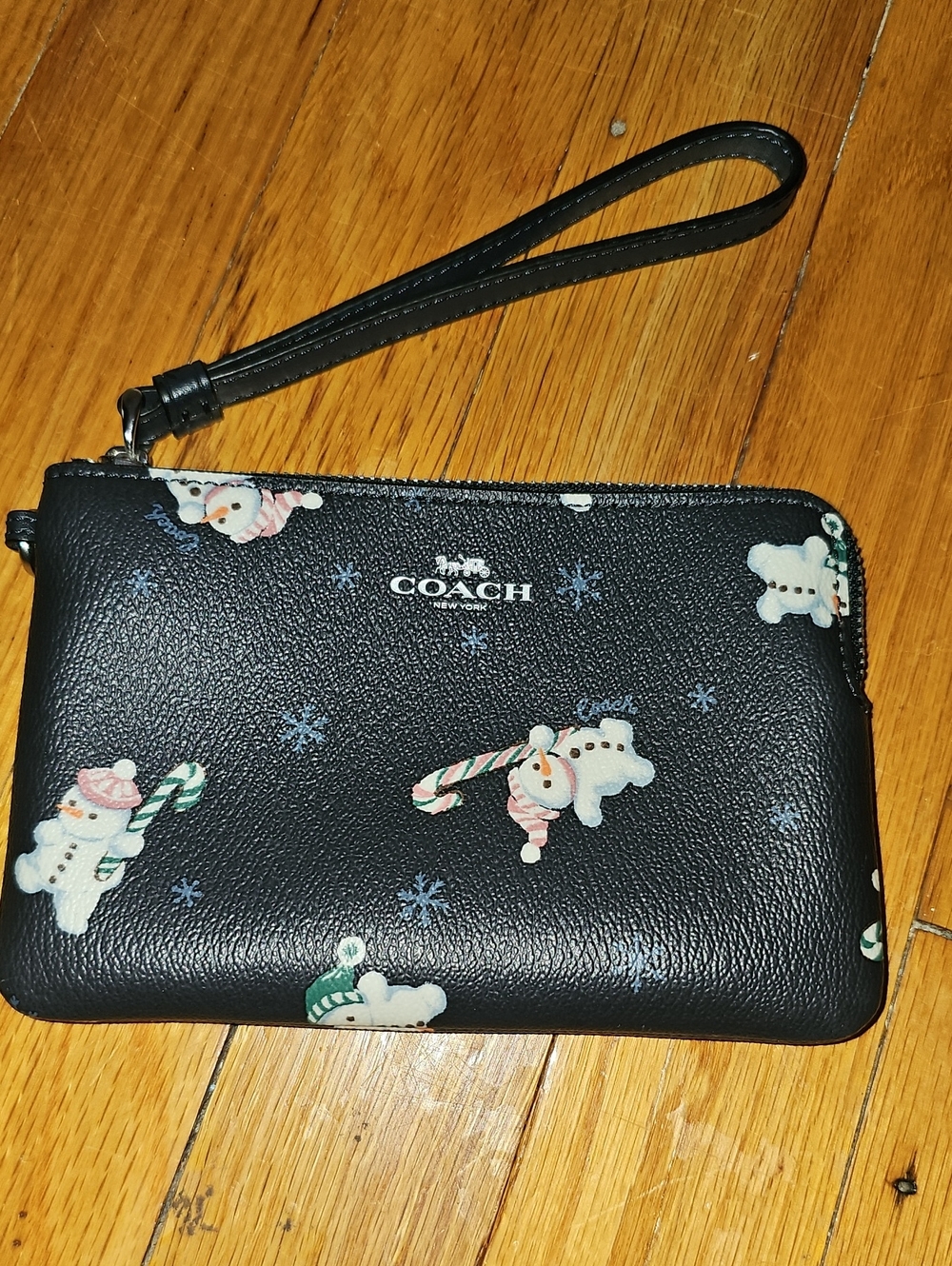 Coach Corner Zip Wristlet with Snowman print & Charms